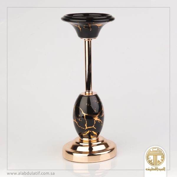 شمعدان اسود بذهبي