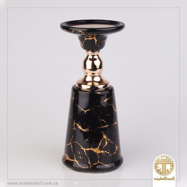 شمعدان اسود بذهبي
