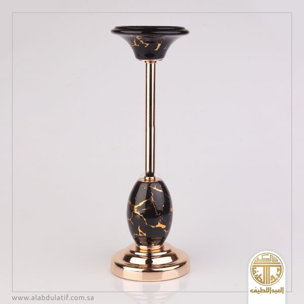 شمعدان اسود بذهبي
