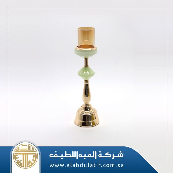 شمعدان ذهبي بزجاج اخضر